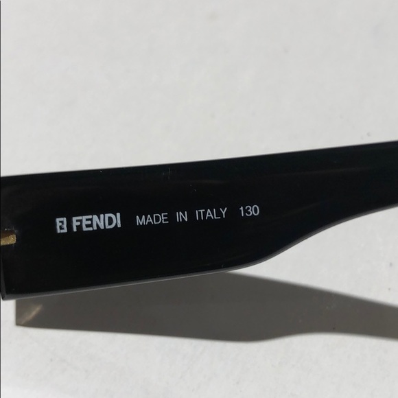 Fendi women’s ebony black /gold sunglasses FS118